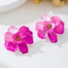 Pink floral stud earrings for women with layered flower petals on a clean product background.